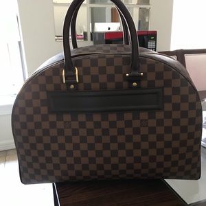 Authentic LV travelers bag